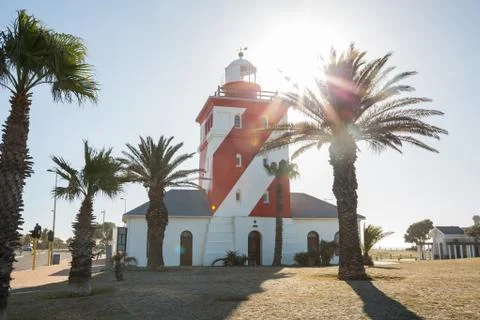 Lighthouse surrounded by palm trees Foto stock