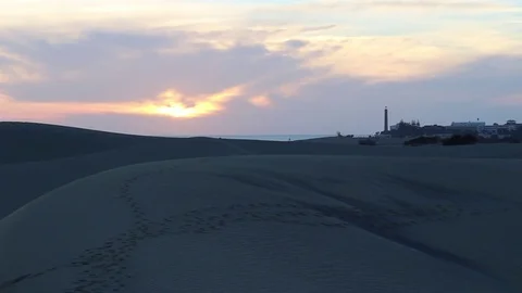 Lighthouse taken from the beach during the sunset Stock Footage 74142832