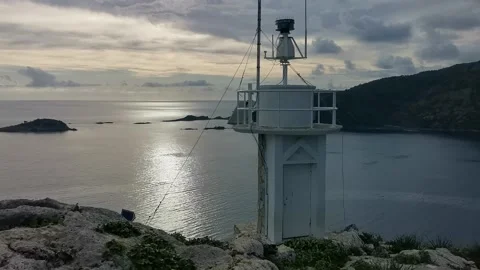 Lighthouse on top of a mountain on an St. Nicholas Island Stock Footage 232793584