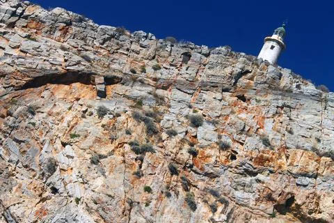 The lighthouse on the top of the rock Foto stock