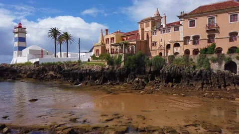 Lighthouse tower with a blue sky in background. Stock Footage 134835413