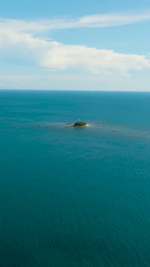 Lighthouse on a tropical island. Stock Footage 265755959