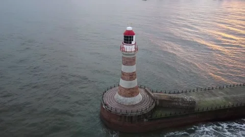 Lighthouse on U.K beach Video stock 184613794