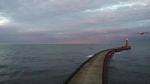 Lighthouse on U.K beach Stock Footage