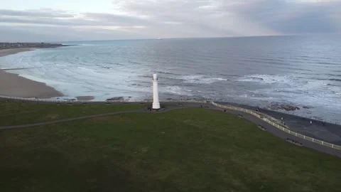 Lighthouse on U.K beach Stock Footage 185146551