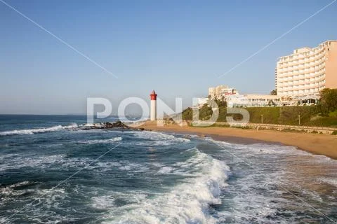 The Lighthouse at Umhlanga with Waves Stock Photos