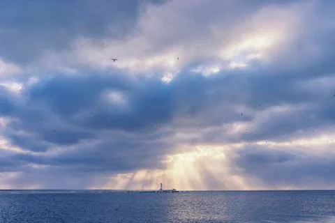 Lighthouse under the sun in the winter Stock Photos