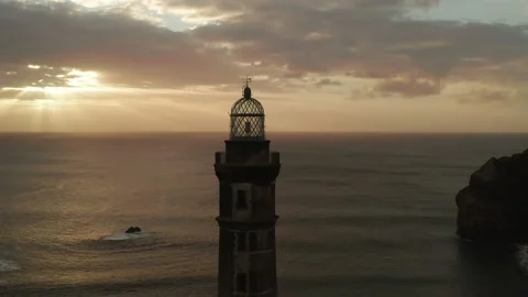 Lighthouse of Volcano Ponta dos Capelinhos Faial Azores 4k aerial drone video Stock Footage 171342628