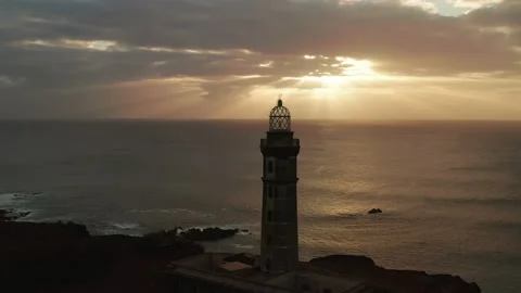 Lighthouse of Volcano Ponta dos Capelinhos Faial Azores 4k aerial drone video Stock Footage 171342632