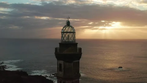 Lighthouse of Volcano Ponta dos Capelinhos Faial Azores 4k aerial drone video Stock Footage 171342633