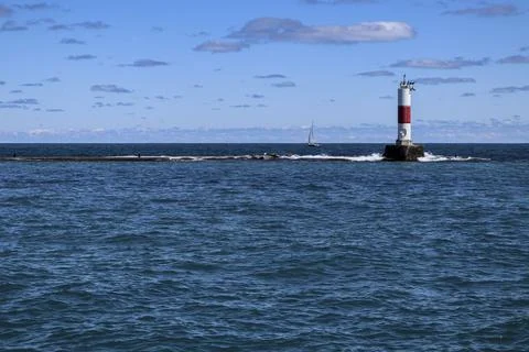 Lighthouse on the water Stock Photos