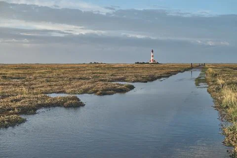 Lighthouse Westerheversand on high tide Stock Photos