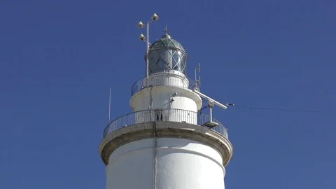 Lighthouse white deep blue sky movement Stock Footage 71762229