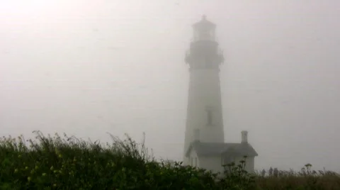  lighthouse in windy fog Stock Footage 536393
