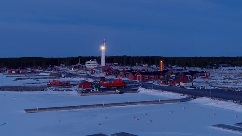 Lighthouse on a winter evening Stock Footage 128930609