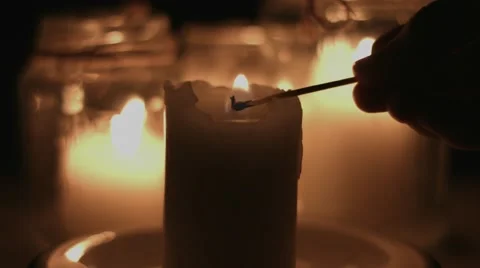 Lighting and Blowing Out A Candle Stock Footage