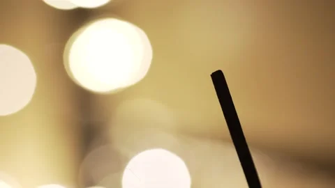 Lighting an aroma stick close up Stockbeeldmateriaal 135826659