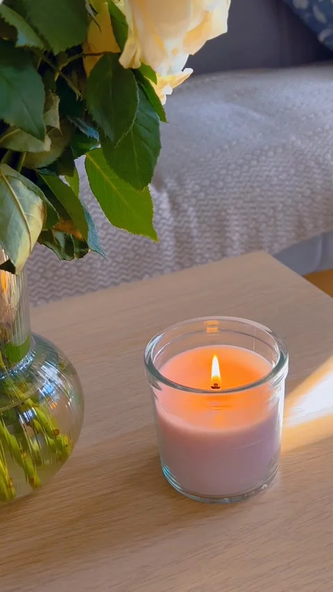 Lighting an aromatic candle for relaxation Stock Footage 332808494