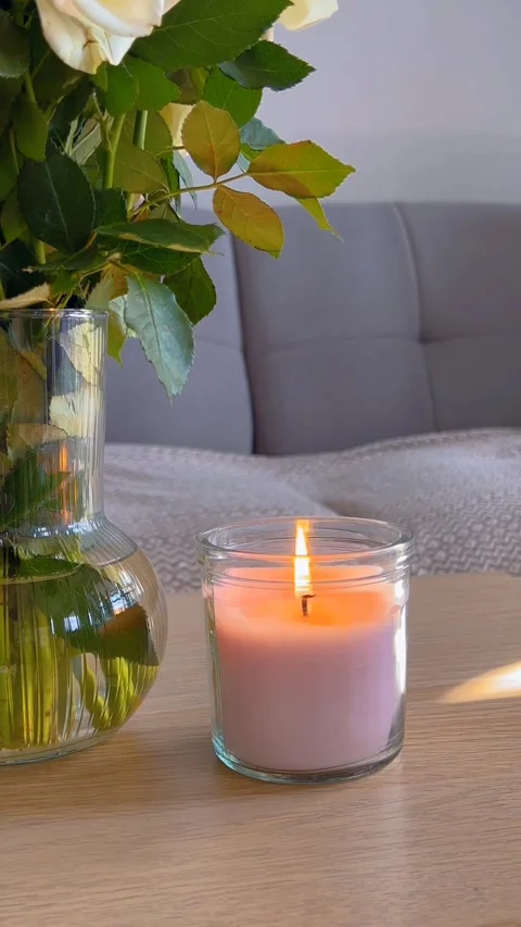 Lighting an aromatic candle for relaxation Stock Footage 332808499