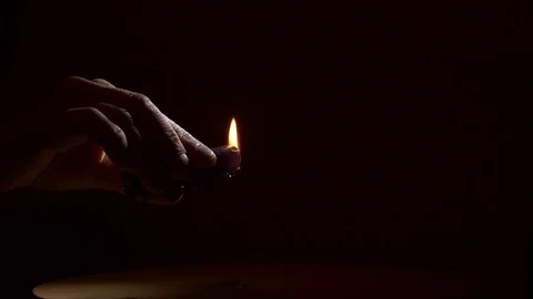 Lighting black candle with matches slow motion Видео 74769861