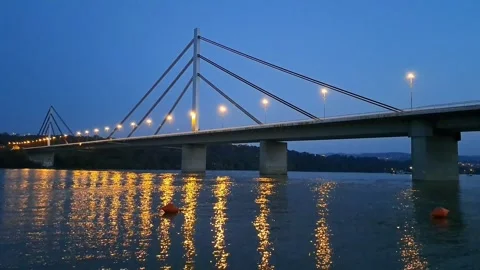Lighting up the Bridge over the River Danube Footage Video stock 248173049