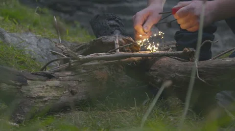 Lighting campfire slow motion, sparks, flint 動画素材 62958634