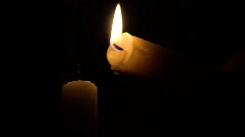 Lighting Candle in the Dark and Blowing it Out 库存影片 81763704