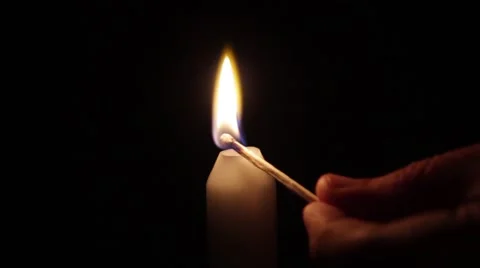 Lighting a candle Stock Footage 42792195