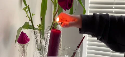 Lighting a candle Stock Footage 177957194