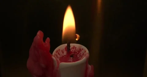 LIGHTING CANDLE with LIGHTER, RED Lighter, SLOW MOTION, MACRO LENS Video stock 255972249