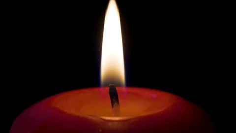 Lighting a Candle With a Match Close up Video stock 113402810