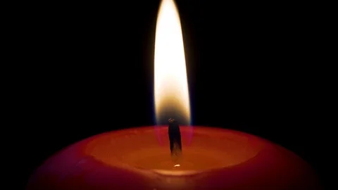 Lighting a Candle With a Match Close up Video stock 113403708