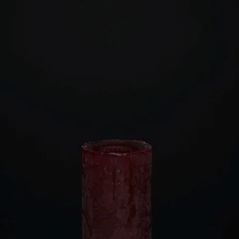 Lighting a candle with a match Stock Footage 69562765