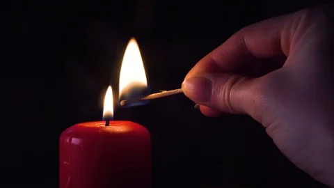 Lighting a Candle With a Match Stock-Footage 113401983