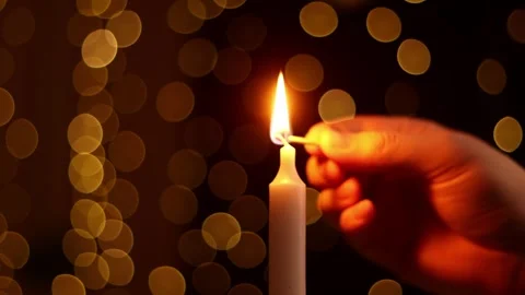 Lighting a Candle with a Match Video stock 339056570