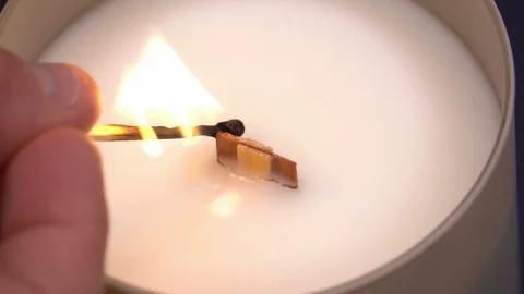 Lighting a candle with a match in slow motion Stock-Footage 117629208