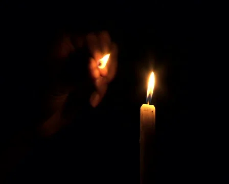 Lighting a candle with matches 库存影片 45500018