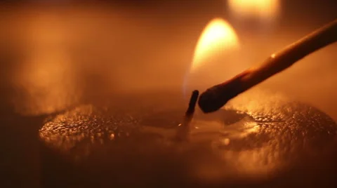 Lighting candle by matchstick close-up Stock Footage 44024809