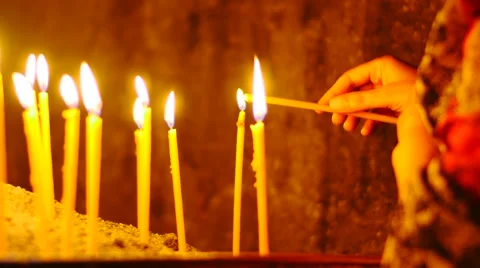 Lighting a Candle in a Monastry Видео 53232607
