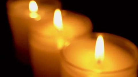 Lighting a Candle in the Night (4K) Video stock 330280566