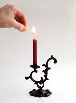 Lighting the candle Foto stock