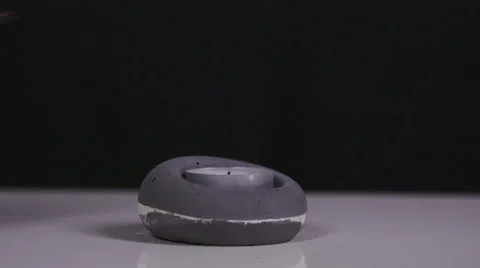 Lighting a candle in slow motion Stock Footage 58761315