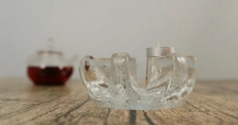 Lighting candle for teapot warmer Stock Footage 119770424