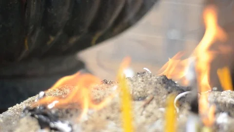 Lighting Candle in temple. Stock Footage 79747852