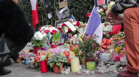 Lighting Candle Vigils at Charlie Hebdo Shooting Memorial Shrine Paris France Stock Footage 46442859