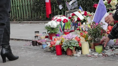 Lighting Candle Vigils at Charlie Hebdo Shooting Memorial Shrine Paris France Stock-Footage 46442876
