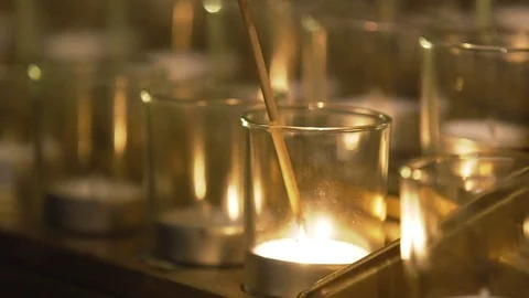 Lighting candle wick from a candle Stock Footage 85166720