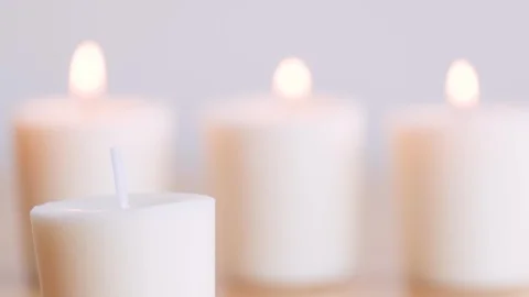 Lighting a candle wick with an electric igniter Stock Footage 119686945