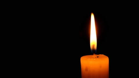 Lighting a candle wick with a match close-up Stock Footage 164620225