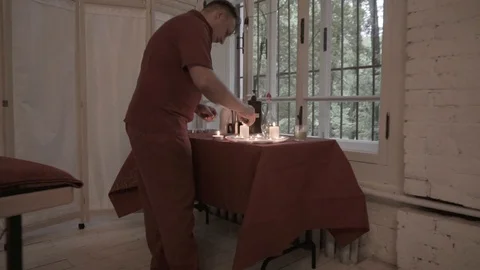 Lighting candles Stock Footage 92127325